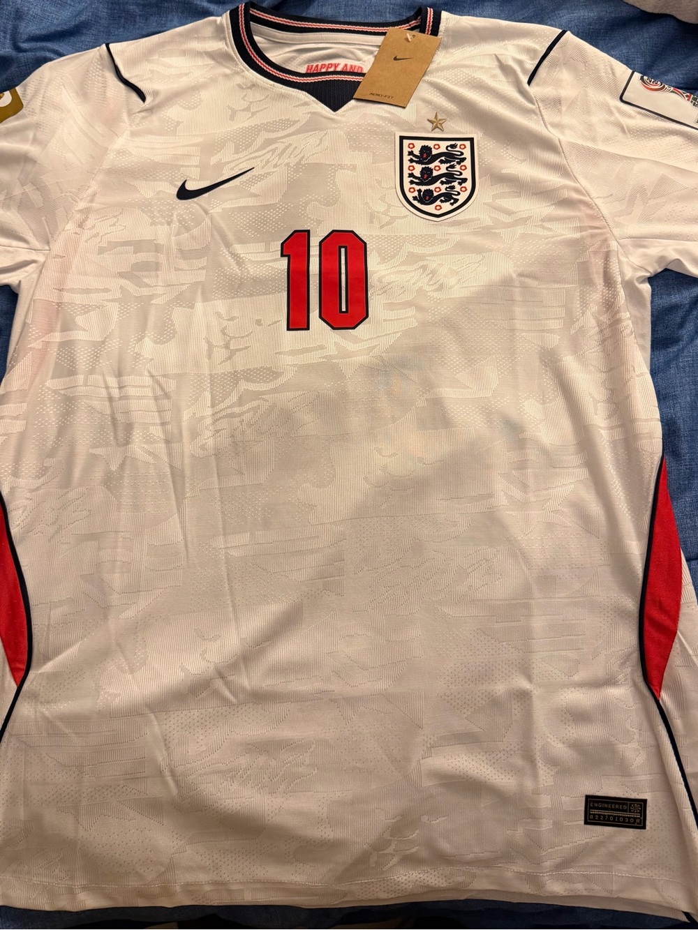 Nike England Men's White Football Jersey with Red Accents